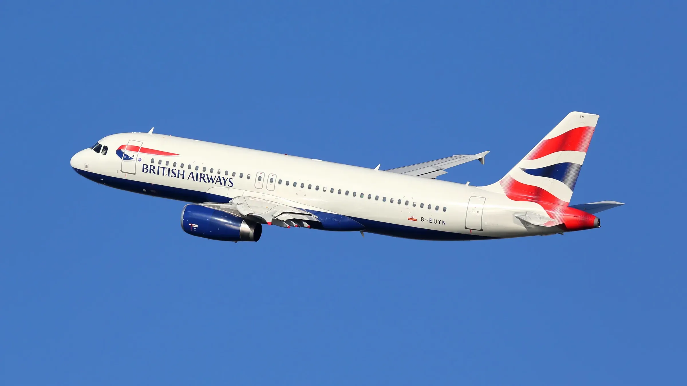 A British Airways Airbus A320 climbing into a blue sky, the airline that answers to Speedbird on the radio.